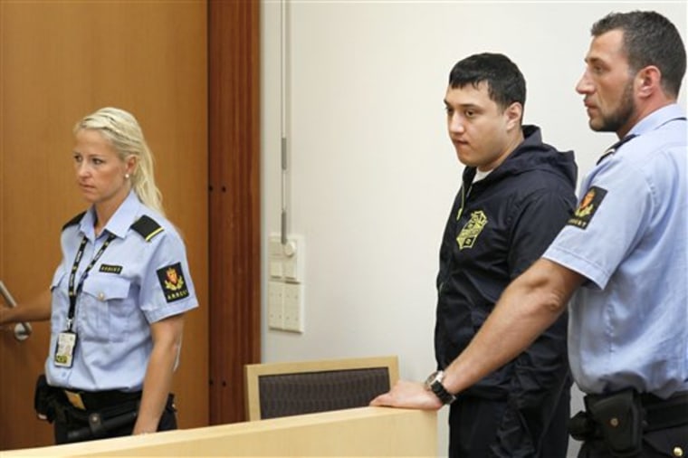 David Jakobsen is led out of Oslo municipal court on July 26. He is one of three people accused of plotting acts of terrorism. When police arrested a suspected al-Qaida cell in Norway last month, they insisted the public was never in danger despite turning up the makings of a bomb lab tucked away in a nondescript Oslo apartment building.